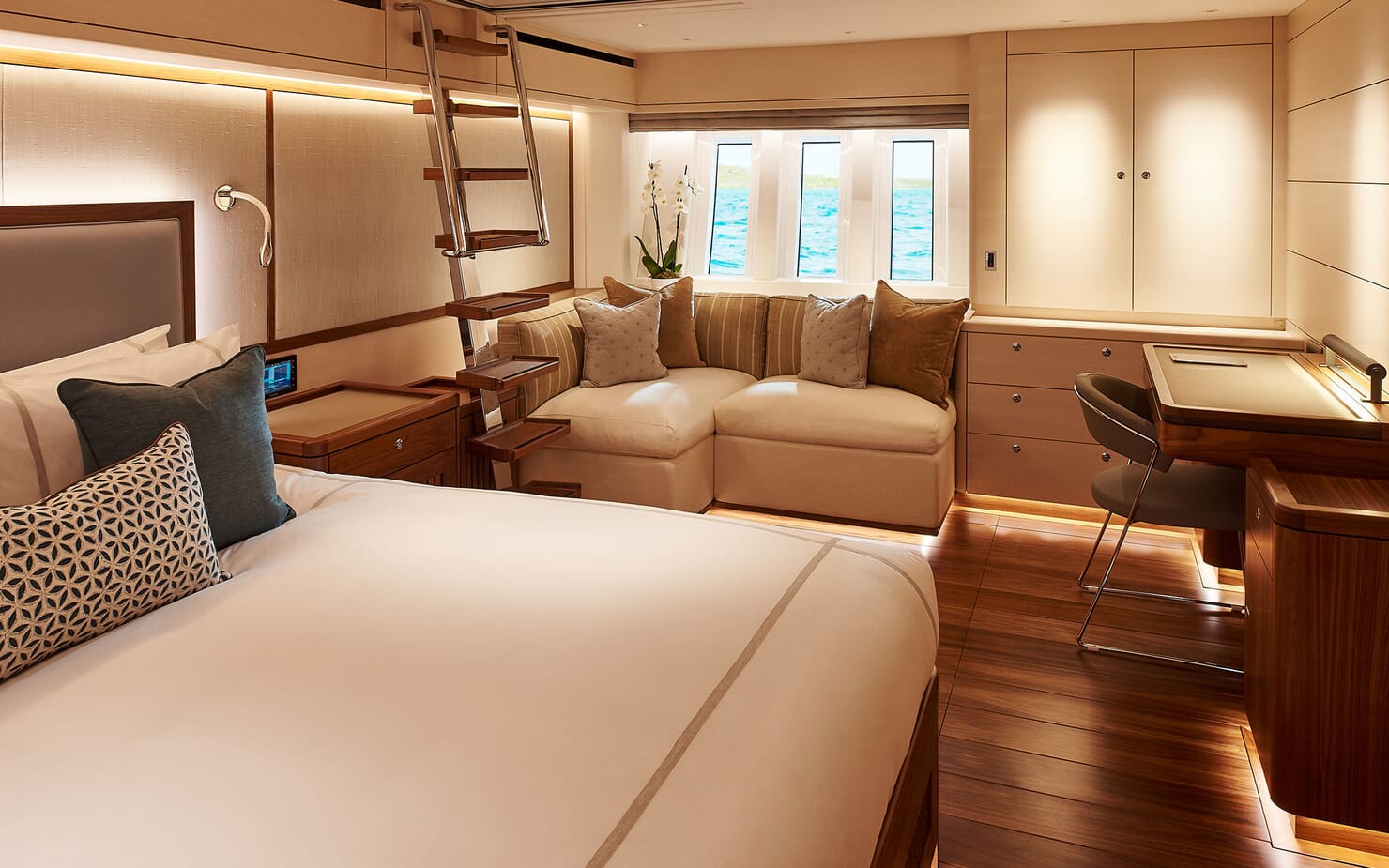 master cabin with seating and desk area.jpg