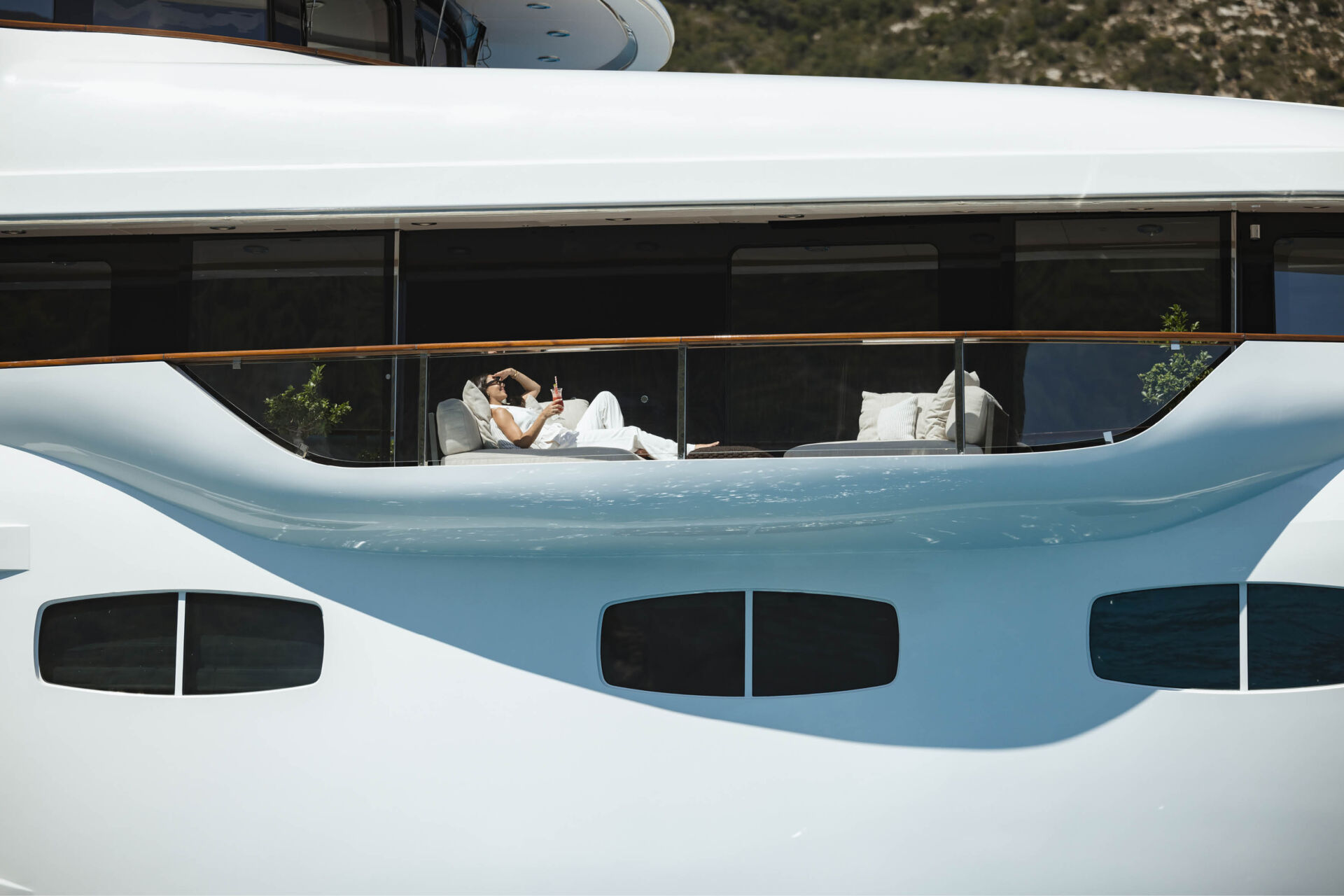 relaxing on a balcony on a yacht.jpg
