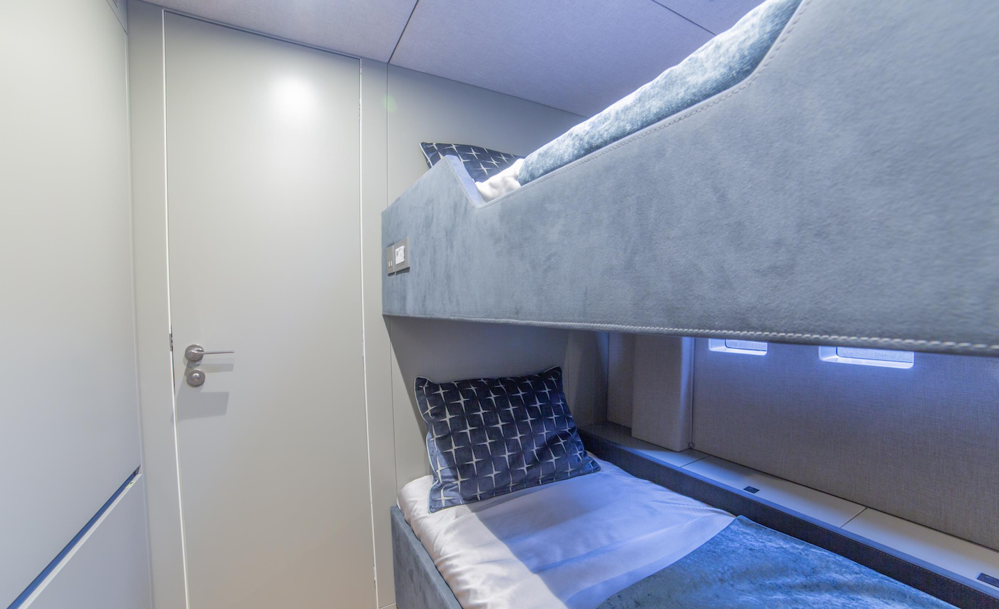 twin guest cabin with bunk beds.png