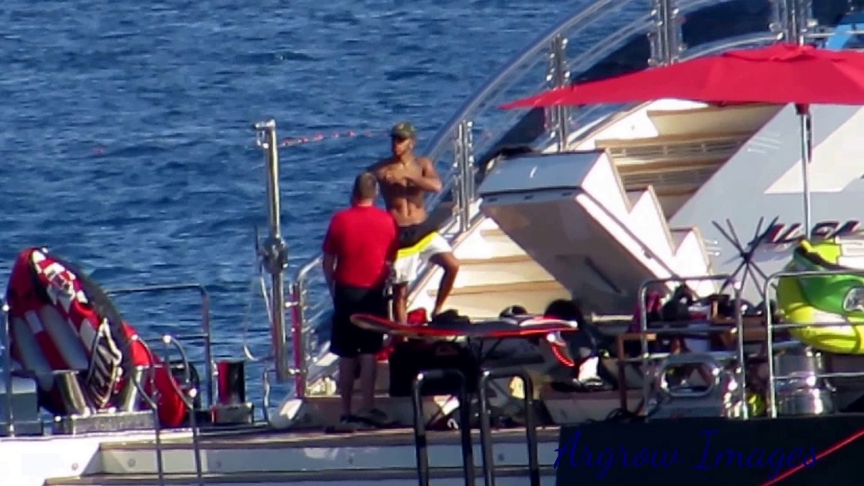 Lewis Hamilton swimming in the pool of ALFA NERO.jpg