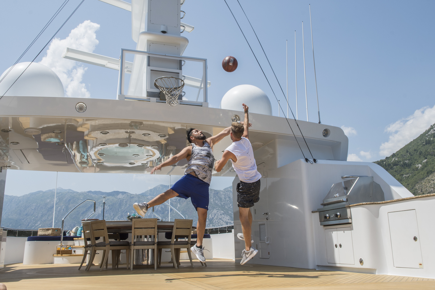 playing basketball on deck of yacht Skyfall.jpg