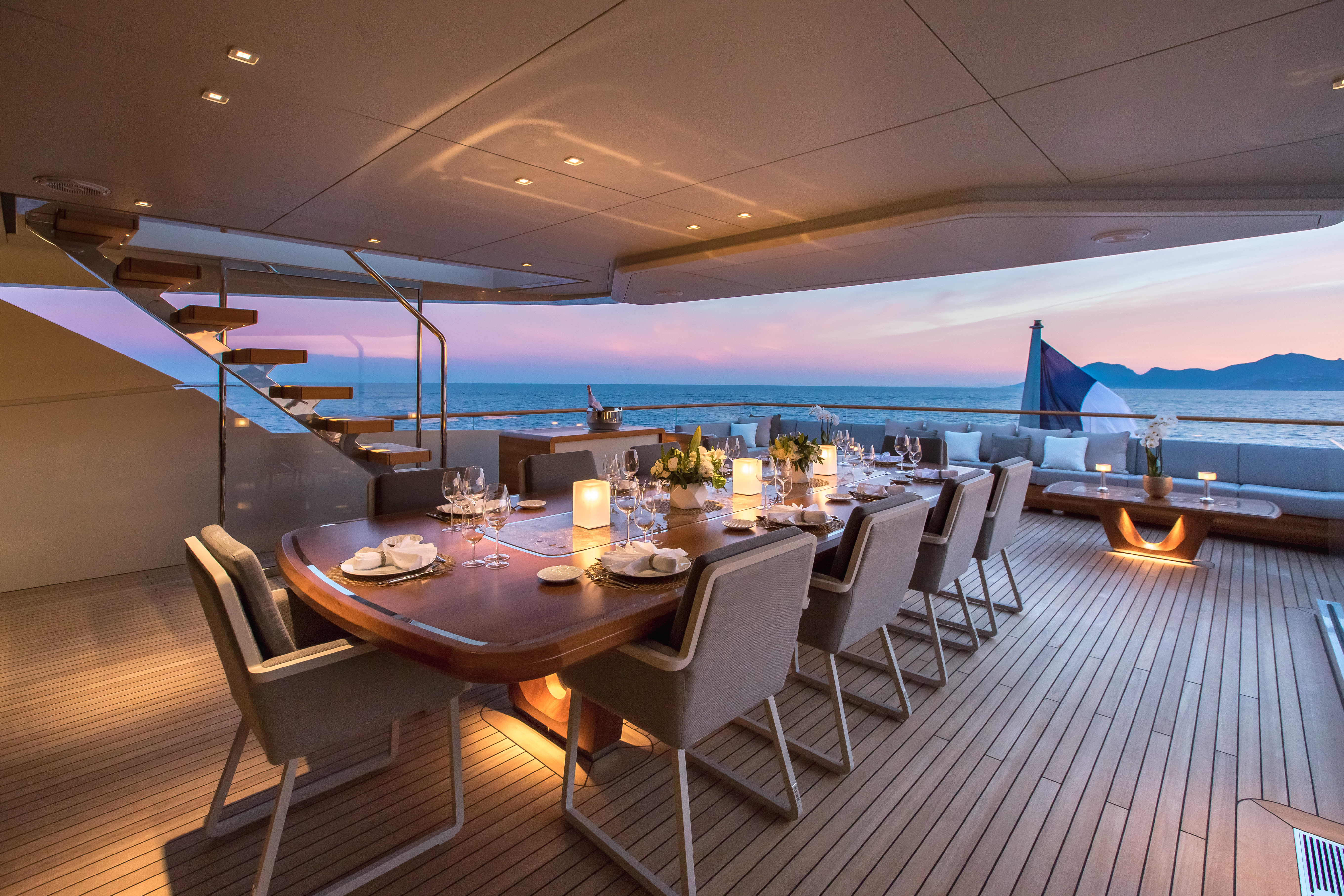 Al fresco dining at sunset aboard VERTIGE yacht.jpg