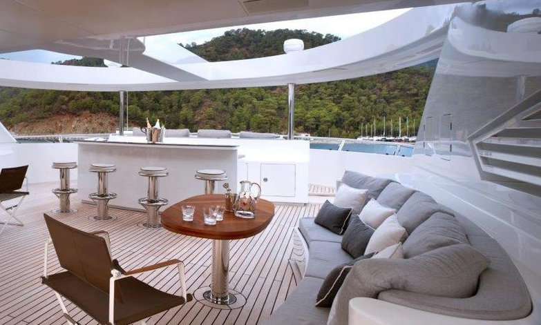Exterior design by ken Freivokh - Sundeck seating and bar.jpg