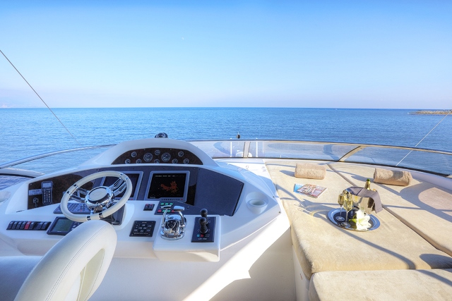 Yacht Live the Moment - Sunpads and helm.jpg