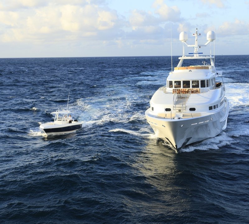 Cruising Including Ship's Tender On Yacht AT LAST