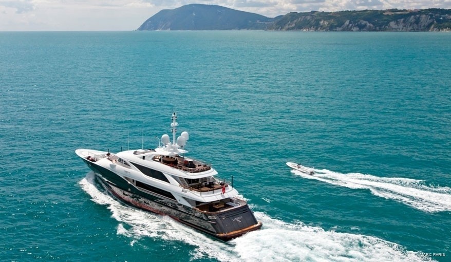 Cruising Including Ship's Tender Alongside On Board Yacht LIBERTY