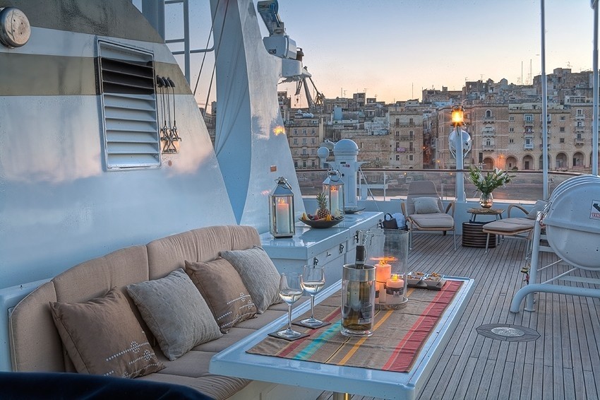 Sunset Dusk: Yacht SANSSOUCI STAR's Deck Sitting Image