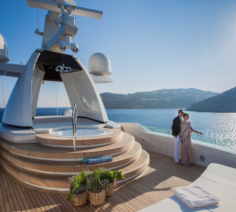 Couple Enjoying The Panoramic Views On The Sun Deck
