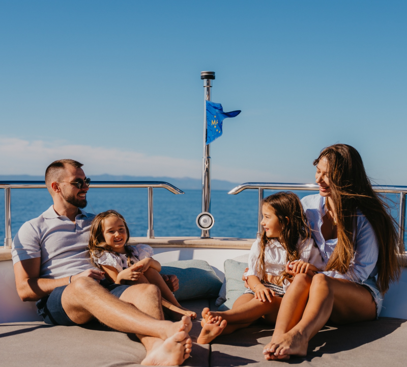 Family With Children On A Yacht