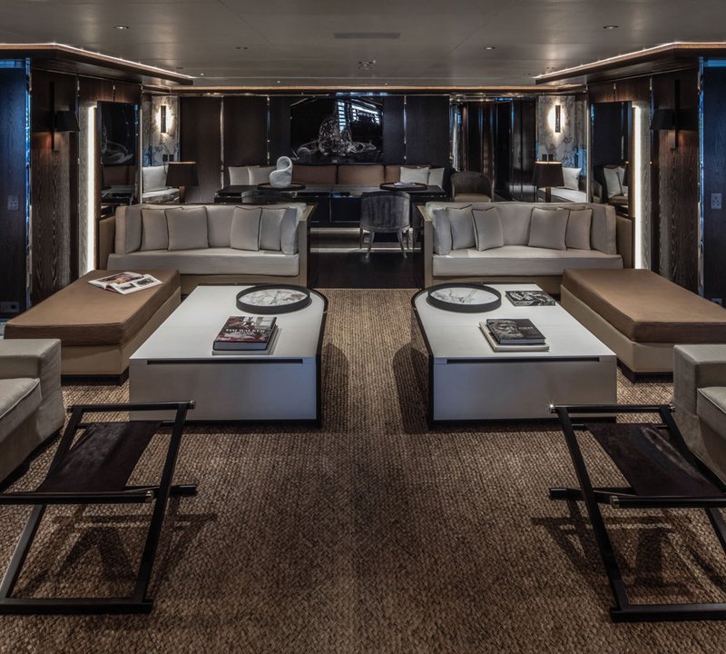 Inviting Main Saloon With Gentleman Style Interior And Convertible Dining Area